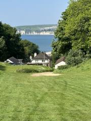 Looking back at Seaton Bay, climbing eastwards from the River Axe